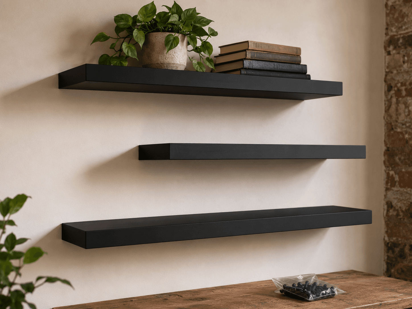 Loft Shelf Trio — Rental and first-home living rooms — the first warm-industrial move onto the wall.